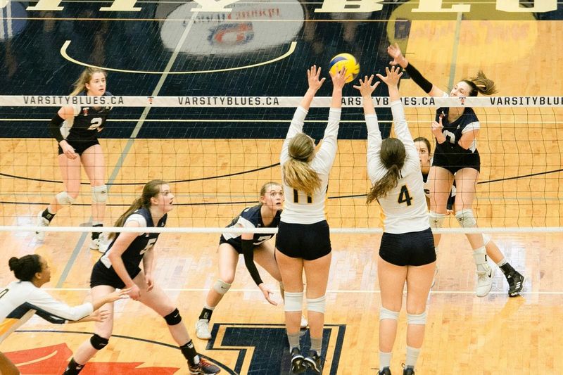 Girl Volleyball Players Defending