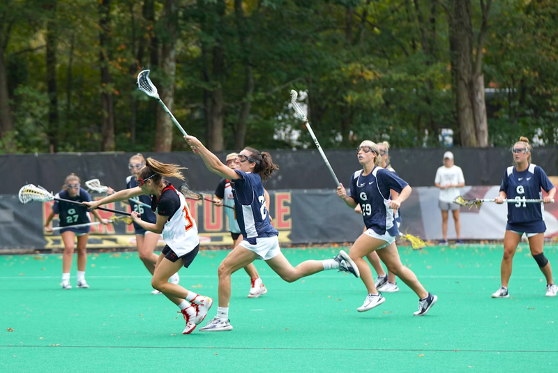 a youth lacrosse team playing lacrosse