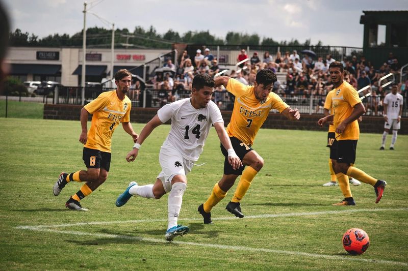 Soccer Players Playing Soccer