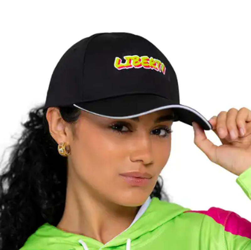 an adult female wearing a black hat with a logo on the front panel