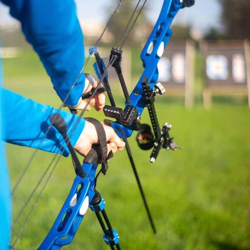 a person preparing to shoot an arrow from an advanced archery bow